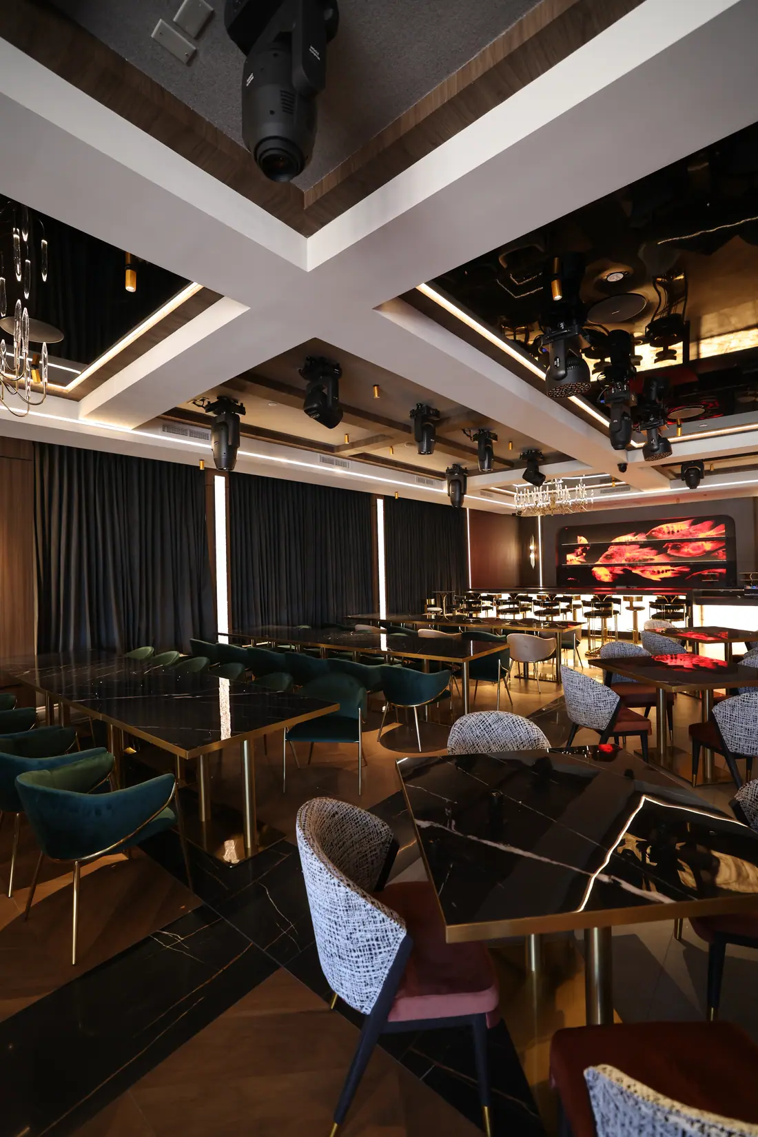 Tables around the dance floor in the main dining room